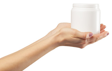 Hand with a cosmetic bottle