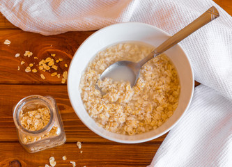 delicious homemade oatmeal for breakfast, closeup, horizontal