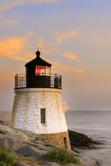 Fototapeta na wymiar Lighthouse on a rocky shore.