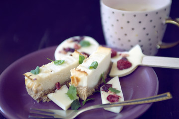 cheese cake dessert with chocolate lollipop and coffee cup