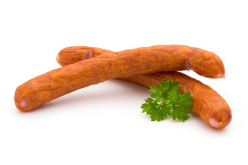 Stack of smoked sausages isolated on a white background.