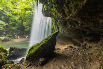 Inside Nabegataki waterfalls in Kumamoto, Kyushu, Japan