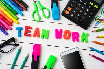 Office desktop with team work word