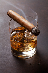 Whiskey with ice and cigar © evgeeenius