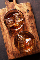Whiskey with ice © evgeeenius