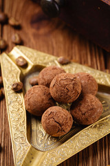 Truffle chocolate candies with cocoa powder