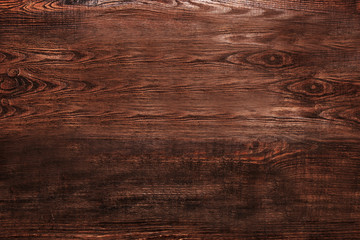 Brown wooden textured background top view. Nobody