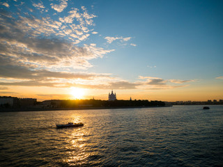 Sunset on the river bank. Saint Petersburg