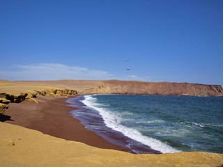 red sand beach