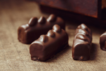 Luxury handmade candies on wooden background