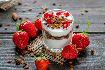 Yogurt with granola and strawberries  