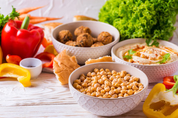 Falafel, pita, hummus and chickpea  with vegetables. horizontal view