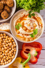 Falafel, pita, hummus and chickpea  with vegetables. Top view