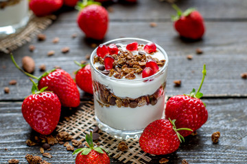 Yogurt with granola and strawberries 