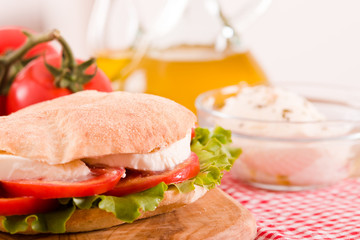 Puccia bread with mozzarella and tomato.