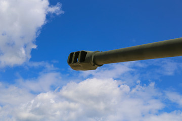 Gun from a tank close-up against a blue sky