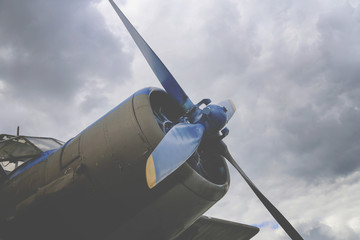 Naklejka na ściany i meble Close up of airplane engine with propeller