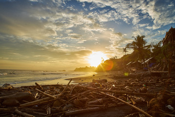 Bali Beach at sunlit sunset                                                     