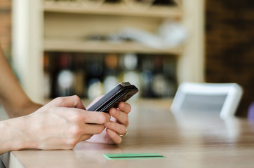 mobile phone side view with credit card