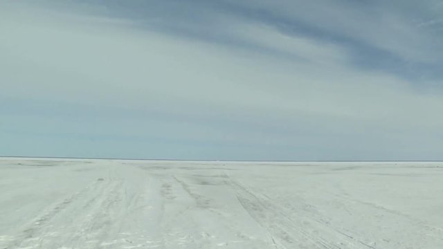 Panorama of a winter landscape to the sea. Winter landscape. Blue sky and snow far.