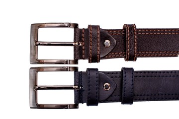 Several fashionable men's leather belts gray brown isolated on white background