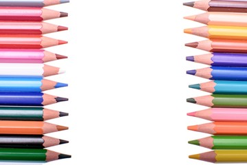 Many colored pencils isolated on white background, place for text