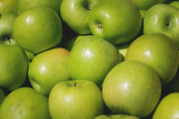 Fototapeta na wymiar Green Apple for sale on market. Agriculture background. Top view. Close-up
