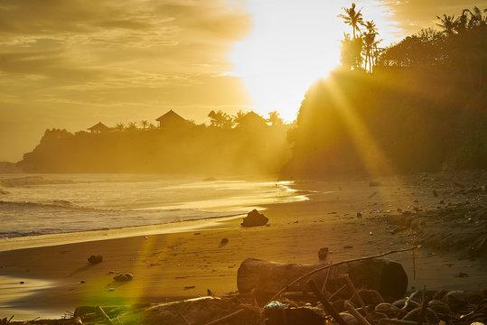 Bali Beach at sunlit sunset                               