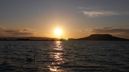 One of Europe's largest lakes - Balaton. Popular tourist tours from many continental countries. Shallow fast warming lake.