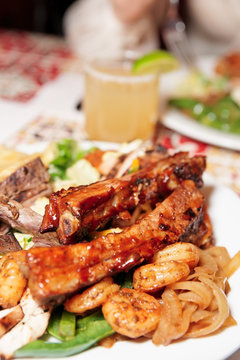 Grilled pork ribs and shrimps