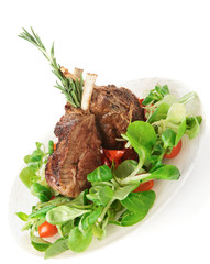 Rare fried rack of lamb isolated on white