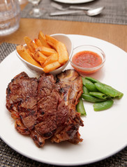 T-bone steak with french fries