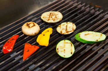 Vegetables and mushrooms on grill