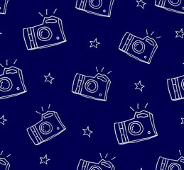 Summer pattern with camera and stars. Ornament for textile and wrapping. Vector background.