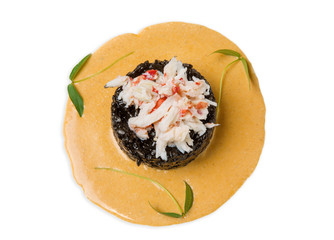 Risotto with crab meat on an isolated background