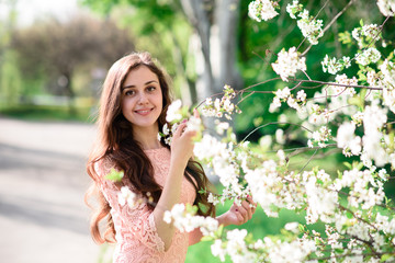 Beautiful girl in a pink dress.