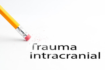 Closeup of pencil eraser and black trauma intracranial text. Trauma intracranial. Pencil with eraser.