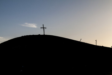 Silhouette of a cross on the hill near Cabo de la Vela village located on La Guajira peninsula, Colombia
