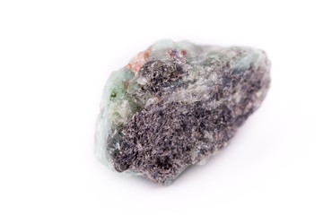 Macro mineral stone Emerald on white background