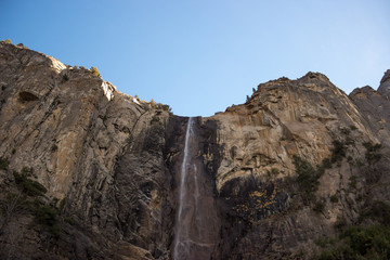 Fototapeta na wymiar Photo of Bridalveil Fall against blue sky at Yosemite National Park, California, CA