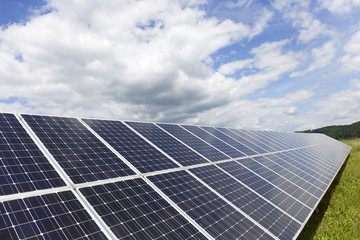 Solar Power Station on the summer Meadow 