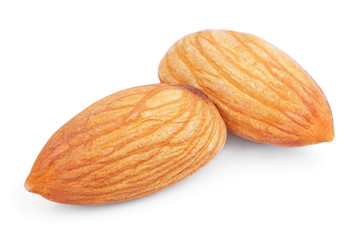 Closeup of two almond nuts isolated on white background