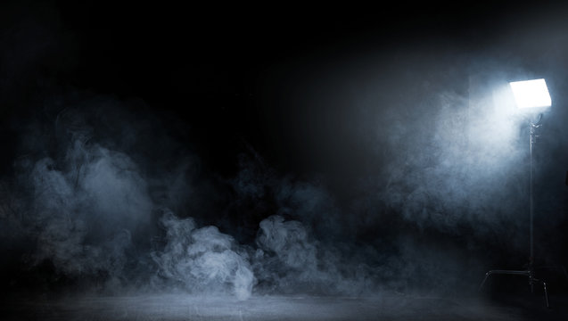 Conceptual image of a dark interior full of swirling smoke