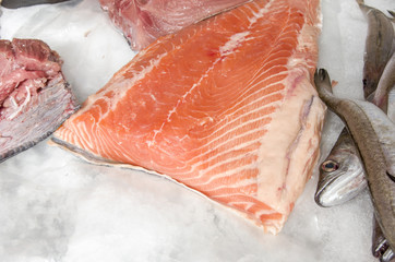 Salmon on ice at the fish market.