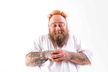 Man with meat on his head