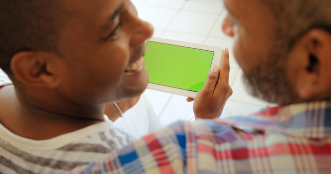 Green Screen Tablet Monitor With Gay Couple Using Internet