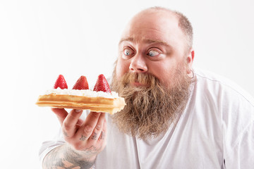 Man staring at sweet food