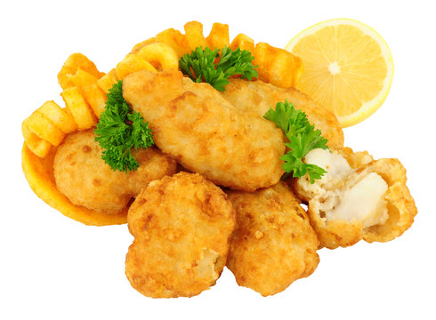 Cod fish nugget bites with curly fries isolated on a white background
