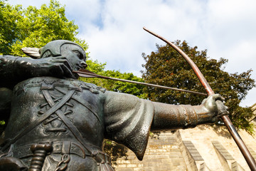 Low angle view of statue of Robin Hood, near Nottingham Castle, Nottingham, England.