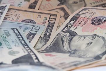 Background of scattered banknotes of different denominations